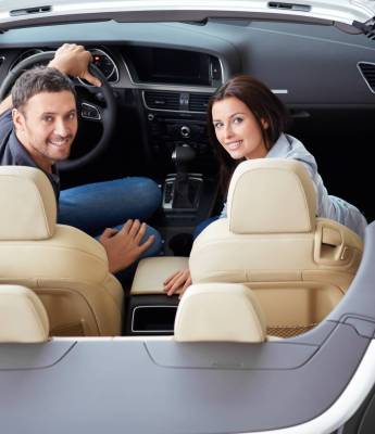 Young couple in a car